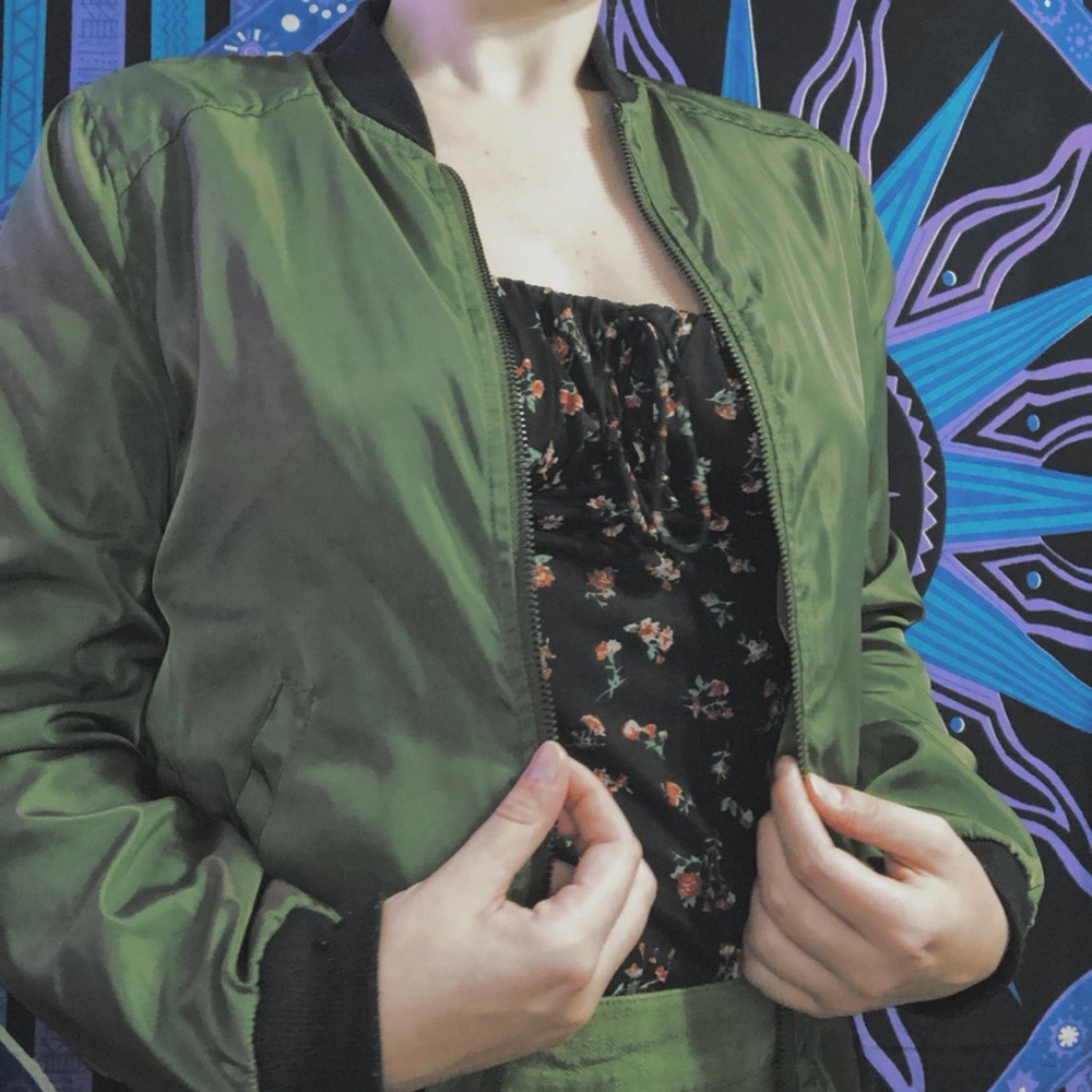 Green and black bomber jacket